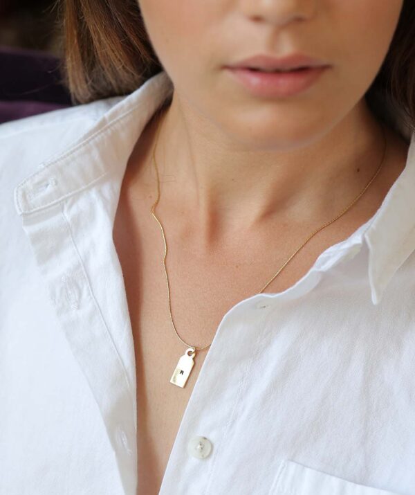 label necklace / yellow gold plating on silver