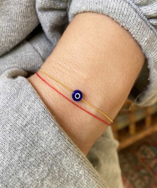 make a wish blue eye bracelet / gold and red thread