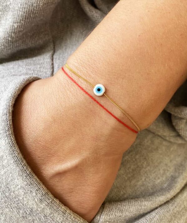 make a wish white eye bracelet / gold and red thread