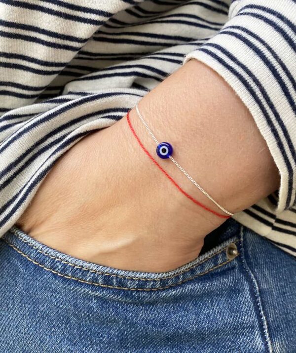 make a wish blue eye bracelet / sterling silver and red thread