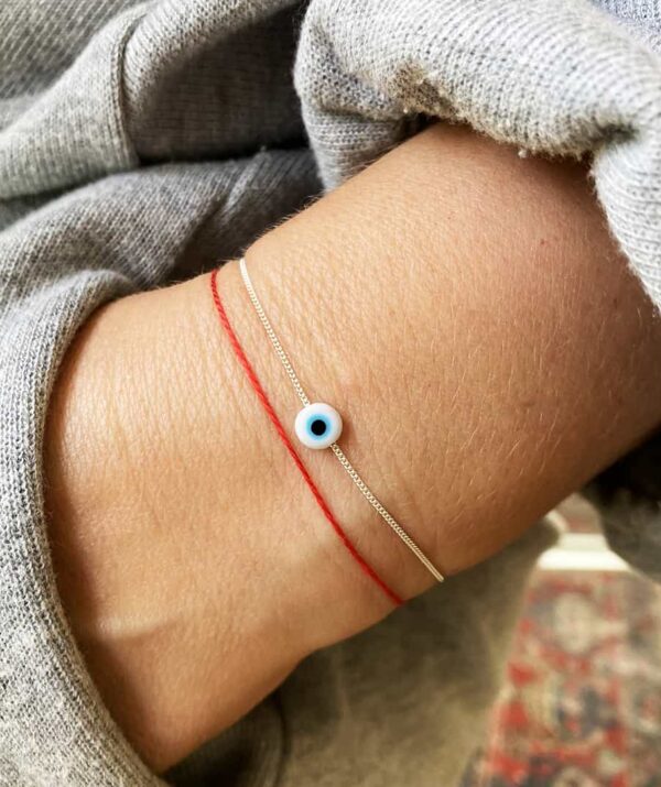 make a wish white eye bracelet / sterling silver and red thread