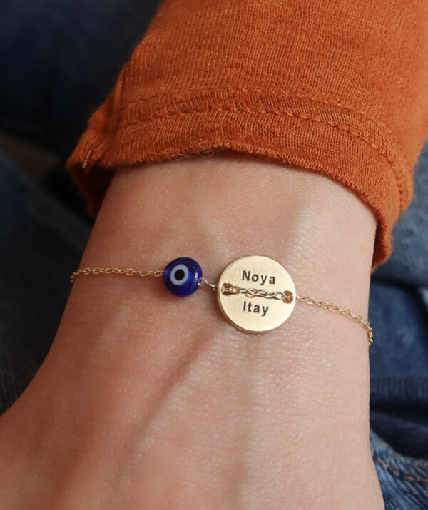 button bracelet blue eye / yellow gold plating on silver